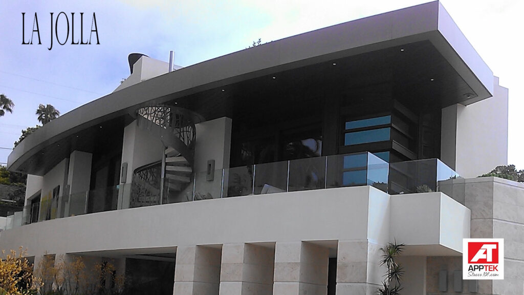 Modern luxury stucco estate home with sleek architecture in La Jolla California